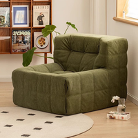 Sofá sin marco amarillo de un solo asiento lujoso moderno, sofá minimalista, con cubierta de cama de sala de estar de tela de madera comprimida al vacío.