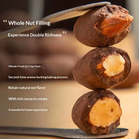 Boules de chocolat fourrées aux amandes croustillantes, enrobées de poudre de cacao, confiserie, collation