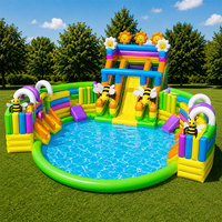 Parc aquatique gonflable commercial avec grande piscine ronde et toboggan aquatique combinés pour les fêtes d'enfants en plein air à louer