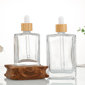 Bouteilles vides d'huile essentielle OEM contenant pour produits de soin de la peau <span class=keywords><strong>flacon</strong></span> compte-gouttes carré en verre transparent avec couvercle en bambou et pipette en caoutchouc - Product Image 3