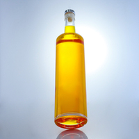 Vente directe usine – Bouteille cylindrique haute en verre 750 ml la plus vendue pour le stockage du whisky, du rhum et du brandy avec bouchon en liège personnalisé