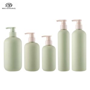 Bouteille à pompe verte en HDPE de 200 ml, 250 ml, 300 ml, 400 ml, 500 ml, forme cylindrique avec épaule oblique pour <span class=keywords><strong>shampoing</strong></span>, après-<span class=keywords><strong>shampoing</strong></span>, lotion - Product Image 1
