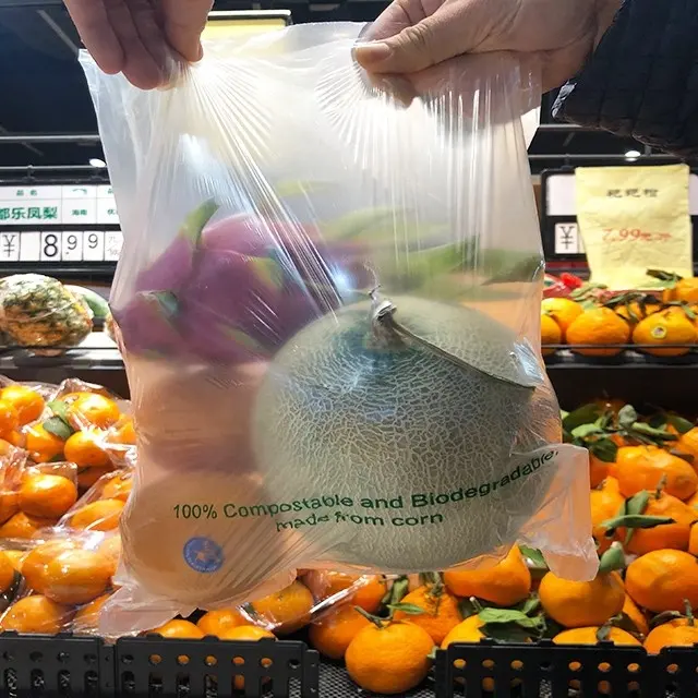 Tas produksi plastik segel bintang mudah terurai ldpe makanan segar kemasan bening tas belanja gulung tas makanan pada gulungan untuk diproduksi