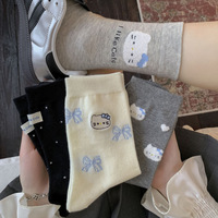 Chaussettes mi-mollet à pois en tissu avec nœud en forme de cœur polyvalent brodé avec des éléments de dessin animé mignons