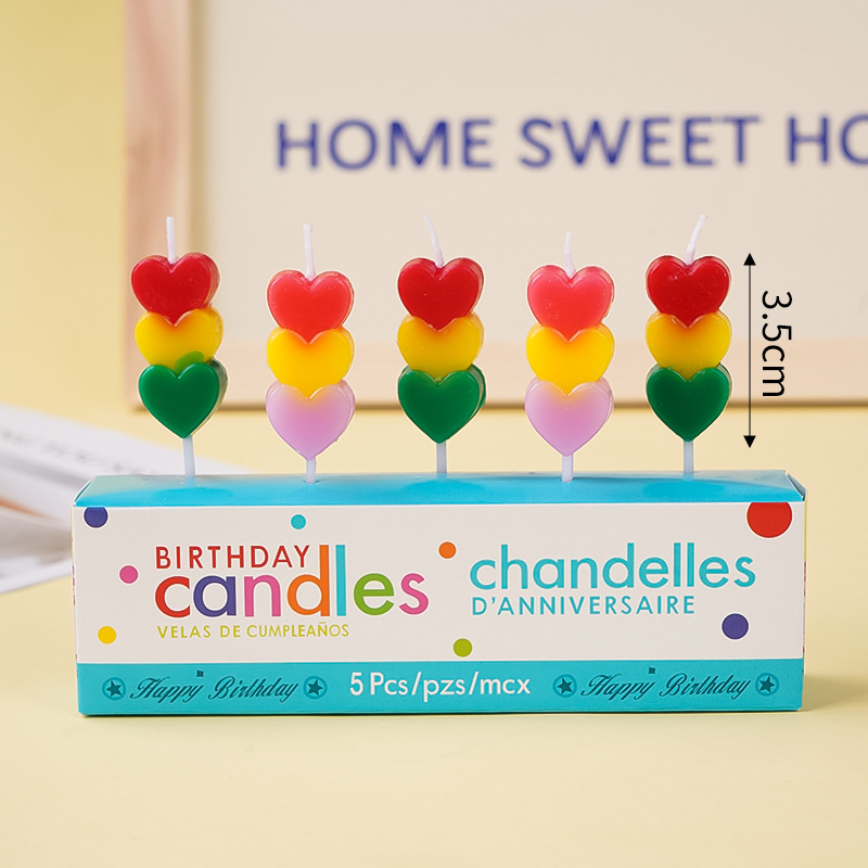 Rangée de bougies en forme de cœur