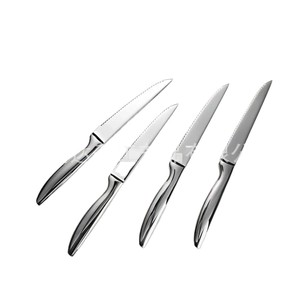 Juego de cuchillos de 4 piezas con hoja pulida y borde serrado para uso en la cocina - Product Image 1