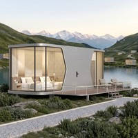 Maison conteneur en acier type capsule spatiale, préfabriquée, modulaire, extensible, en kit, avec zone de couchage et cuisine