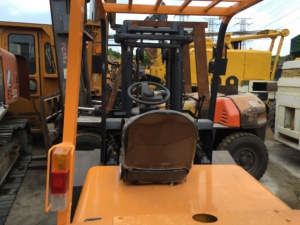 Used 5 Ton <b>Mini</b> TCM Forklift FD50 USA Diesel Engine 4WD Rough Terrain Three Stage Mast Solid Tires Manual Operation Side Shifter - Product Image 3
