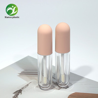 Tube transparent pour gloss à lèvres avec capuchon couleur macaron, flacon vide en plastique pour rouge à lèvres liquide, vente en gros OEM/ODM
