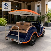 Voiture électrique rétro nostalgique avec phares ronds et sièges beiges pour les promenades, les visites touristiques et les excursions en hôtel