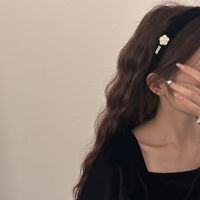 Serre-têtes élégants populaires en camélia, bandeaux coréens en tissu noir et blanc à fleurs, accessoires pour cheveux pour femmes, diadème de camélia