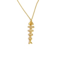 Collier pendentif unique Gemnel en forme d'arête de poisson, plaqué or 18 carats, bijoux en laiton, style hip-hop punk, collier squelette de poisson pour hommes et femmes