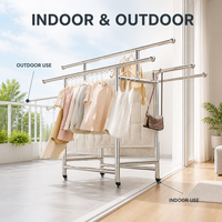 Porte-vêtements double barre autoportant et mobile en acier inoxydable sur roulettes pour rangement de chambre