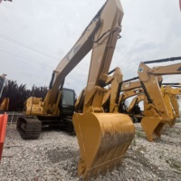 Excavatrice Caterpillar 320CL d'occasion à faible nombre d'heures de fonctionnement, 20 tonnes, avec godet robuste pour travaux miniers