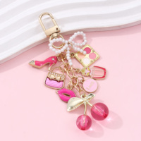 Porte-clés vintage élégant en alliage émaillé, avec motif rouge à lèvres, nœud perlé, cerise et parfum, style doux, pour décoration de sac