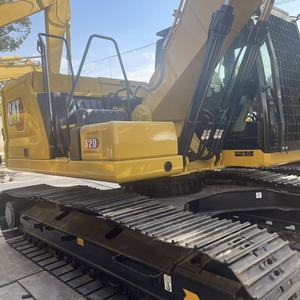 Excavatrice CAT d'occasion, équipement de construction lourd de couleur jaune - Product Image 4