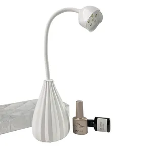 Yeni mevcut özelleştirmek 12W Mini taşınabilir USB esnek jel Uv Led tırnak lambası gül tasarım 360 döndür kurutma kür lambası