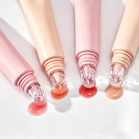Tube cosmétique vide à presser avec breloque nœud perlé, emballage de brillant à lèvres en plastique, logo personnalisé
