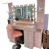 Table de toilette et de maquillage rose au design européen avec fonction anti-basculement et miroir éclairé pour chambre et hôtel