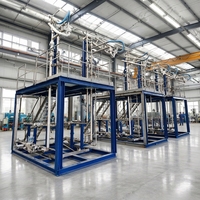 Système de chargement et de déchargement de liquides sur châssis avec contrôleur de lots, bras de chargement et escalier pliant pour essence, diesel, GPL