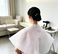 Cape de coupe de cheveux jetable non tissée de haute qualité, tablier de protection jetable pour salon de coiffure