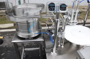 Máquina automática de llenado y etiquetado de botellas de aceite esencial de Rosa bomba peristáltica Mitsubishi