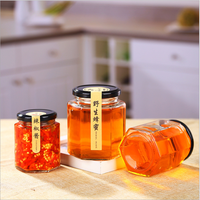 Emballage de miel Pot en verre hexagonal transparent de haute qualité 45ml-730ml pour confiture Sauce chili pâte de citron avec couvercle en métal