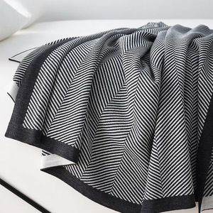 Venta al por mayor nórdico simple viento de punto diseño de onda nueva línea de manta de punto