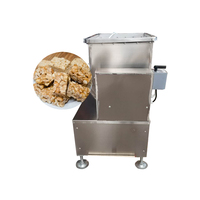 Machine à mélanger les barres de céréales, les bonbons granola, les cacahuètes croustillantes, la pâte de dattes, les noix