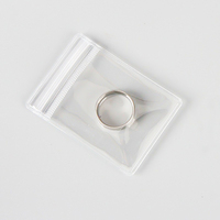 Pochette en plastique avec logo imprimé personnalisé Petit sac à fermeture éclair en PVC transparent pour bague, boucle d'oreille, collier, emballage de bijoux