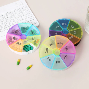 Pilulier de voyage rond coloré à prix d'usine en gros, distributeur de pilules portable 7 jours, mignon, en PP de qualité alimentaire, résistant aux enfants, pour le rangement - Product Image 1