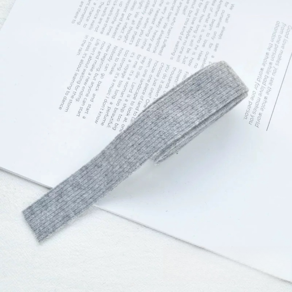 Gris claro 2,5 cm x 25 años por rollo.