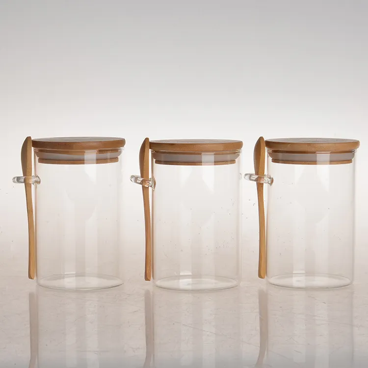 Écologique Caractéristique borosilicate verre alimentaire pot à épices hermétique clair bocal de stockage en verre ensembles avec bambou cuillère presse couvercle