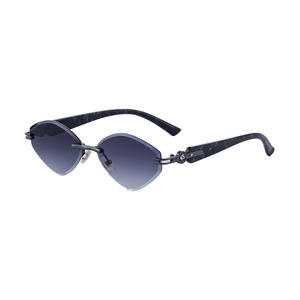 Gafas de sol de lujo con montura de ojo de gato sin marco para mujer, de plástico negro y metal, con protección UV400, estilo urbano y a la moda. - Product Image 5