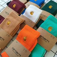 Chaussettes en coton pour hommes et femmes, style streetwear européen/américain, avec semelle en tissu éponge, logo brodé doré, absorbant la transpiration