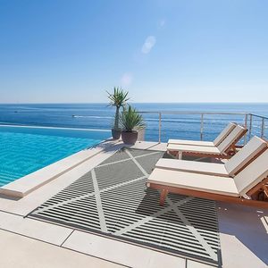Vente en gros de <span class=keywords><strong>tapis</strong></span> d'extérieur durables jacquard en polypropylène robuste pour barbecue et animaux domestiques résistant aux taches et à la décoloration - Product Image 4