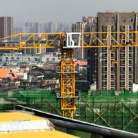 Grue à tour à plateforme plate DAHAN avec capacité de charge nominale de 10 tonnes, hauteur de levage maximale de 200 m, portée de 70 m, haute efficacité, garantie d'un an