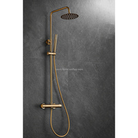 Ensemble de robinetterie de douche thermostatique pour salle de bain, finition dorée, design industriel, avec poignée sculptée à température constante