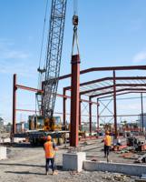 Entrepôt industriel préfabriqué en acier durable et moderne pour usage en centre commercial et en garage, avec services de fabrication sur mesure