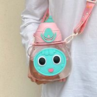 Bouteille d'eau de sport aux grands yeux de dessin animé mignon avec couvercle Pop-Up 600ml tasse à boire de paille en plastique pour enfants sac à écoulement direct