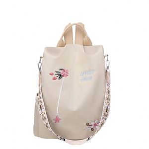 Mochila escolar infantil de lona con estampado de dinosaurio, diseño personalizado y moderno, hecha de poliéster, ideal para actividades. - Product Image 1