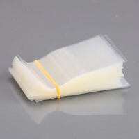 Bandes thermorétractables transparentes en PVC/PET personnalisées en gros avec perforation pour les scellages de bouteilles en plastique/verre