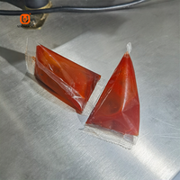 Machine d'emballage automatique pour petits sachets de sauce tomate, de boissons et de liquides en forme de triangle