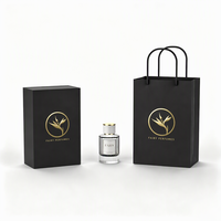 Flacon de parfum en verre rond rechargeable de haute qualité, boîte cadeau en forme de livre au design personnalisé pour l'emballage de marques de parfum