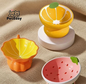 2025 nuevo diseño Popular cuenco para mascotas inclinado <span class=keywords><strong>de</strong></span> patas altas en forma <span class=keywords><strong>de</strong></span> fruta para gatos y perros plato <span class=keywords><strong>de</strong></span> porcelana individual antivuelco - Product Image 1