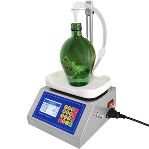 Machine de remplissage quantitative à pompe à diaphragme pour pâte de sésame, huile comestible, parfum, solution liquide orale, vin et solutions de boissons - Product Image 1