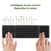 Nouveau clavier à écran tactile triple pliant Recharge BT sans fil léger mince Portable Mini clavier usine en gros transfrontalier
