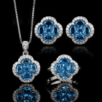 Ensemble de bijoux, bague, boucles d'oreilles, collier en cristal bleu pointu, élégant et luxueux, trèfle à quatre feuilles, nouveau modèle pour femmes, vente en gros