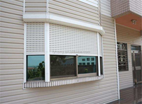 Ventes directes d'usine, porte de garage à enroulement avec isolation thermique en mousse PU, caractéristiques de prévention des incendies, design moderne