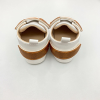FS Vente en gros usine Chaussures Prewalker blanches à semelles souples Chaussures de marche légères pour tout-petits pour nouveau-nés de 0 à 12 mois Nouveau bébé en PU